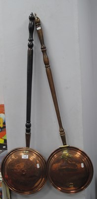 Lot 1323 - Two large copper bed warmers, length approx....