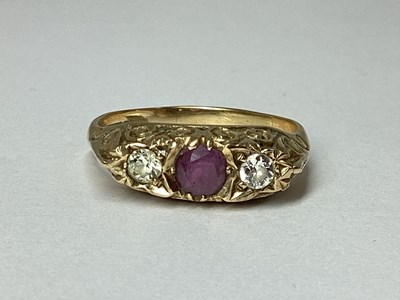 Lot 84 - A 9ct Gold Three Stone Ring, claw set within...