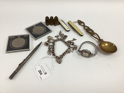 Lot 204 - A Hallmarked Silver Curb Link Charm Bracelet,...