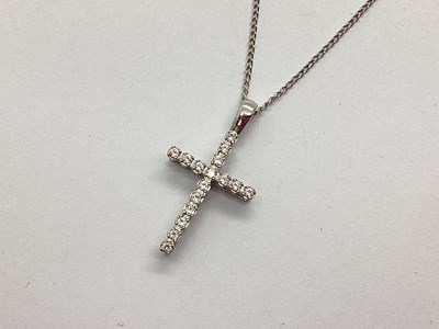 Lot 100 - A 9ct White Gold Cross Pendant, claw set...