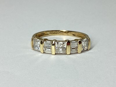 Lot 48 - QVC; A CZ Set Dress Ring, mixed cut, between...