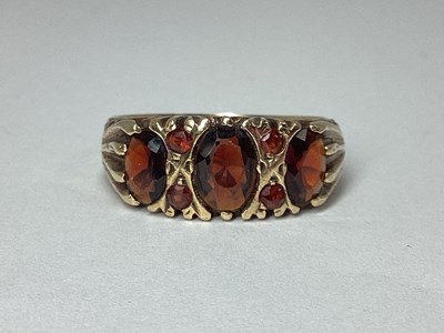 Lot 50 - A 9ct Gold Oval Three Stone Ring, of graduated...