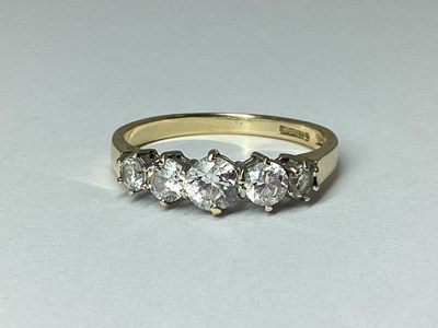 Lot 79 - QVC; A CZ Set Five Stone Ring, the graduated...