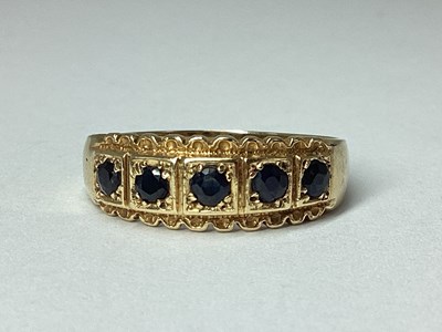 Lot 56 - A 9ct Gold Five Stone Ring, inset within...