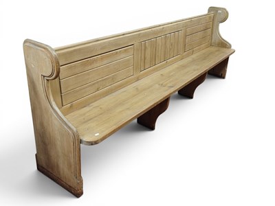 Lot 1471 - Pine Church Pew, with a panelled back, shaped...
