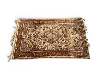 Lot 1531 - Middle Eastern Silk Tassele Rug, featuring a...