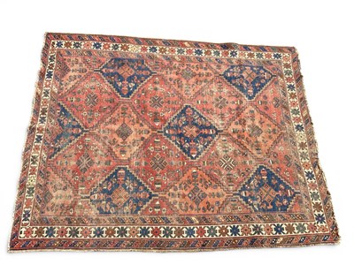 Lot 1493 - Middle Eastern Wool Rug with diamond motifs to...