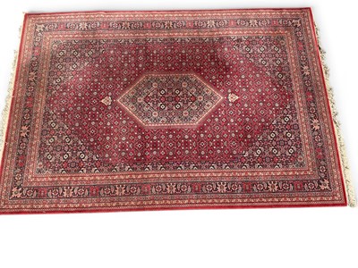 Lot 1472 - Wool Tassel Carpet with central hexagonal...