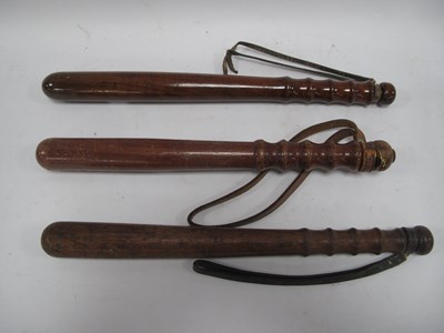 Lot 1300 - Three vintage wooden police truncheons,...