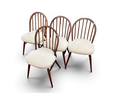Lot 1499 - A Set of Four Dark Ercol Dining Chairs with...