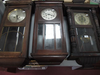 Lot 1139 - Three vintage wooden cased wall clocks, for...