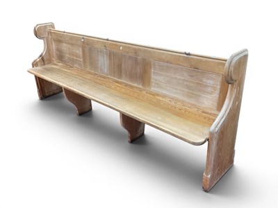 Lot 1535 - Pine Church Pew, with a panelled back, shaped...